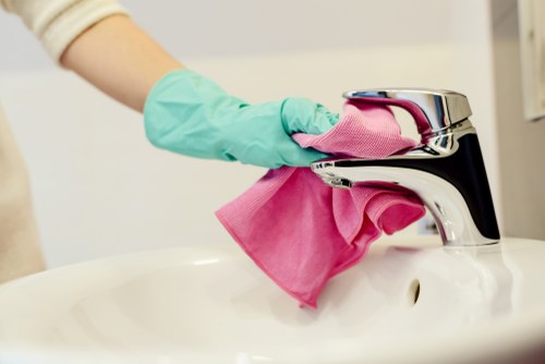 Office cleaning team working in a Chiswick business workspace
